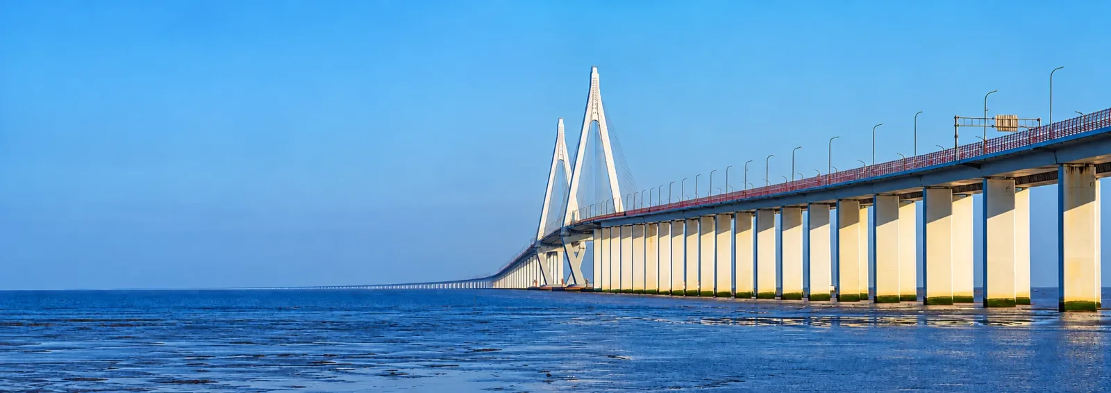 Sea-crossing bridge under a blue sky